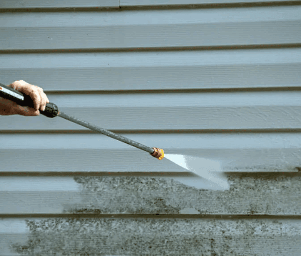 pressure washer to clean dirt and grime